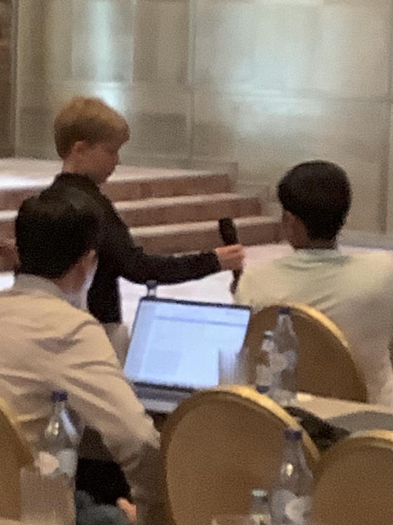 Sean helping with the microphone